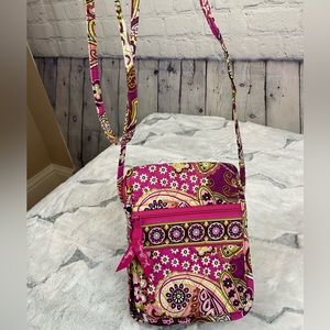 Vera Bradley small crossbody quilted purse in pinks and purples.